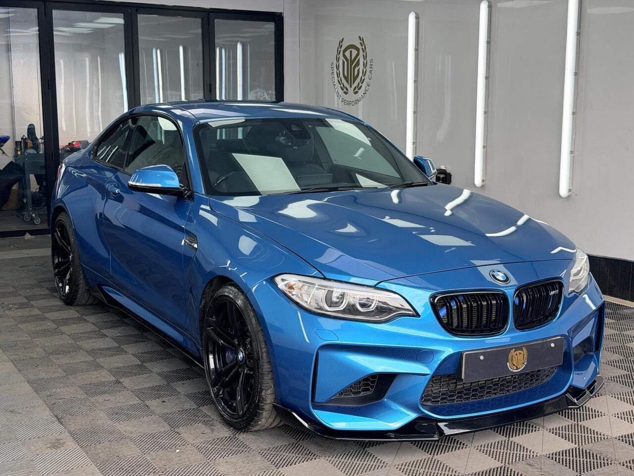 A BMW M2 prepared for sale in the Specialist Performance Cars showroom