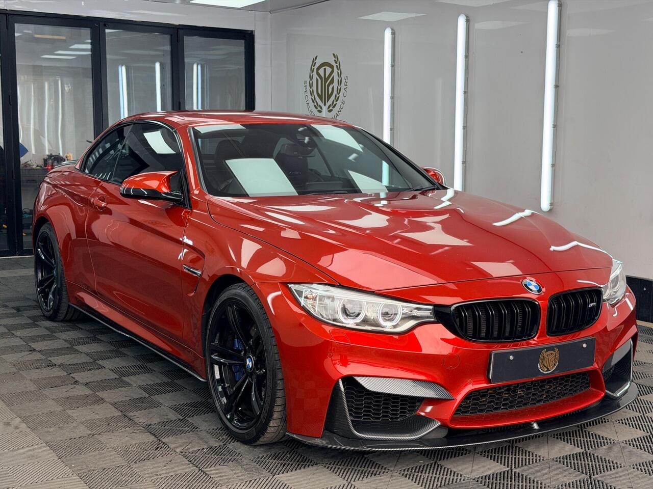 A BMW M4 prepared for sale in the Specialist Performance Cars showroom